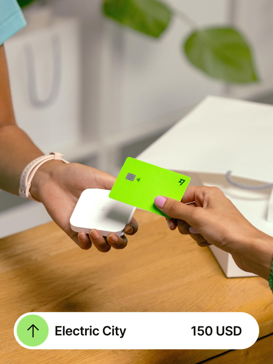 Someone using a Wise Multi-Currency Card to pay the electricity bill